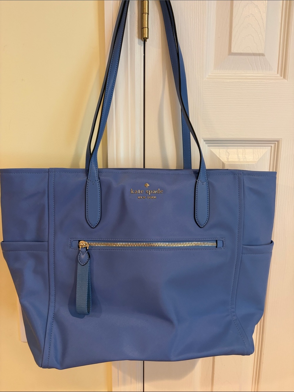 kate spade blue leather tote with front zip pocket